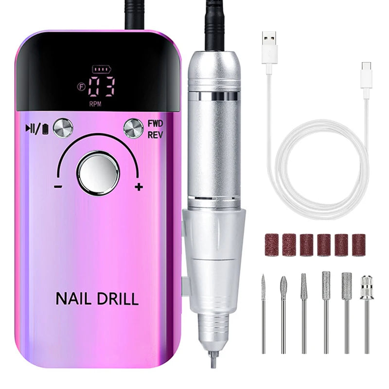 Kit de ponceuse électrique rechargeable rose et noir avec embout amovible et diverses pointes.