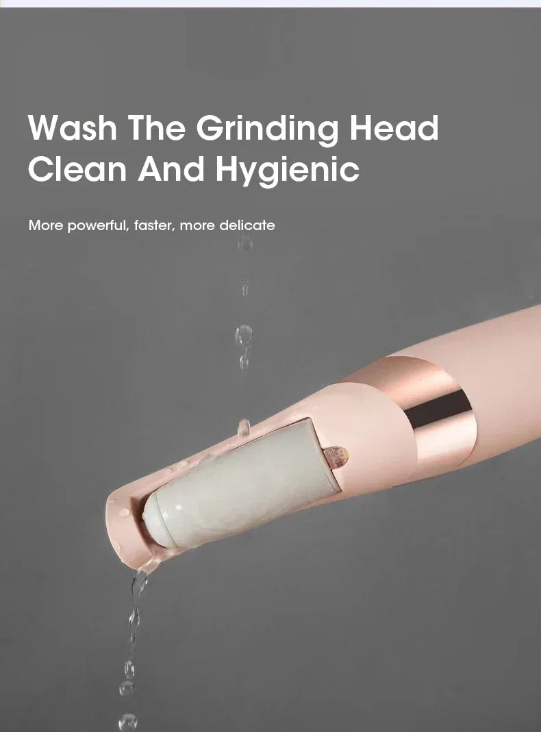 A close-up of a pink automatic electric foot grinder dispensing liquid onto a surface.
