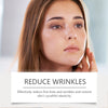 A woman looking forward with smooth skin, demonstrating the effect of a collagen overnight peel-off facial mask.
