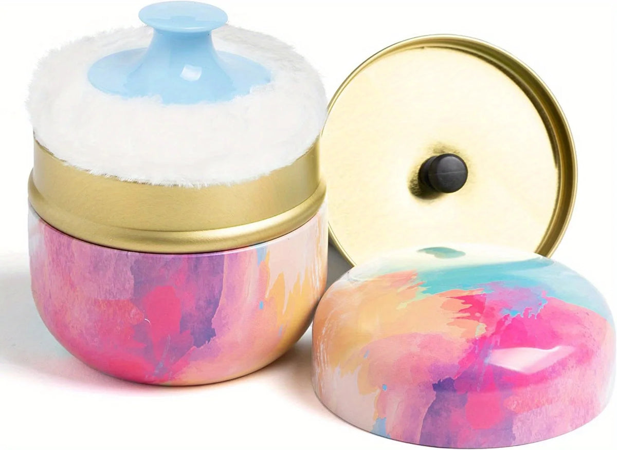 Éponge et boîte de poudre de maquillage portable avec un corps aquarelle rose et un couvercle bleu clair.
