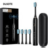 A black electric toothbrush and its replacement heads are shown next to its packaging.