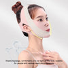 A woman is wearing a pink elastic bandage for facial sculpting and slimming, demonstrating its comfortable fit.
