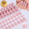 A set of matte pink artificial fingernails displayed on a wooden stick, with a hand showing the size and finish.