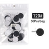 Sac en plastique transparent contenant 50 disques de ponçage remplaçables noir et argent pour les soins des pieds.