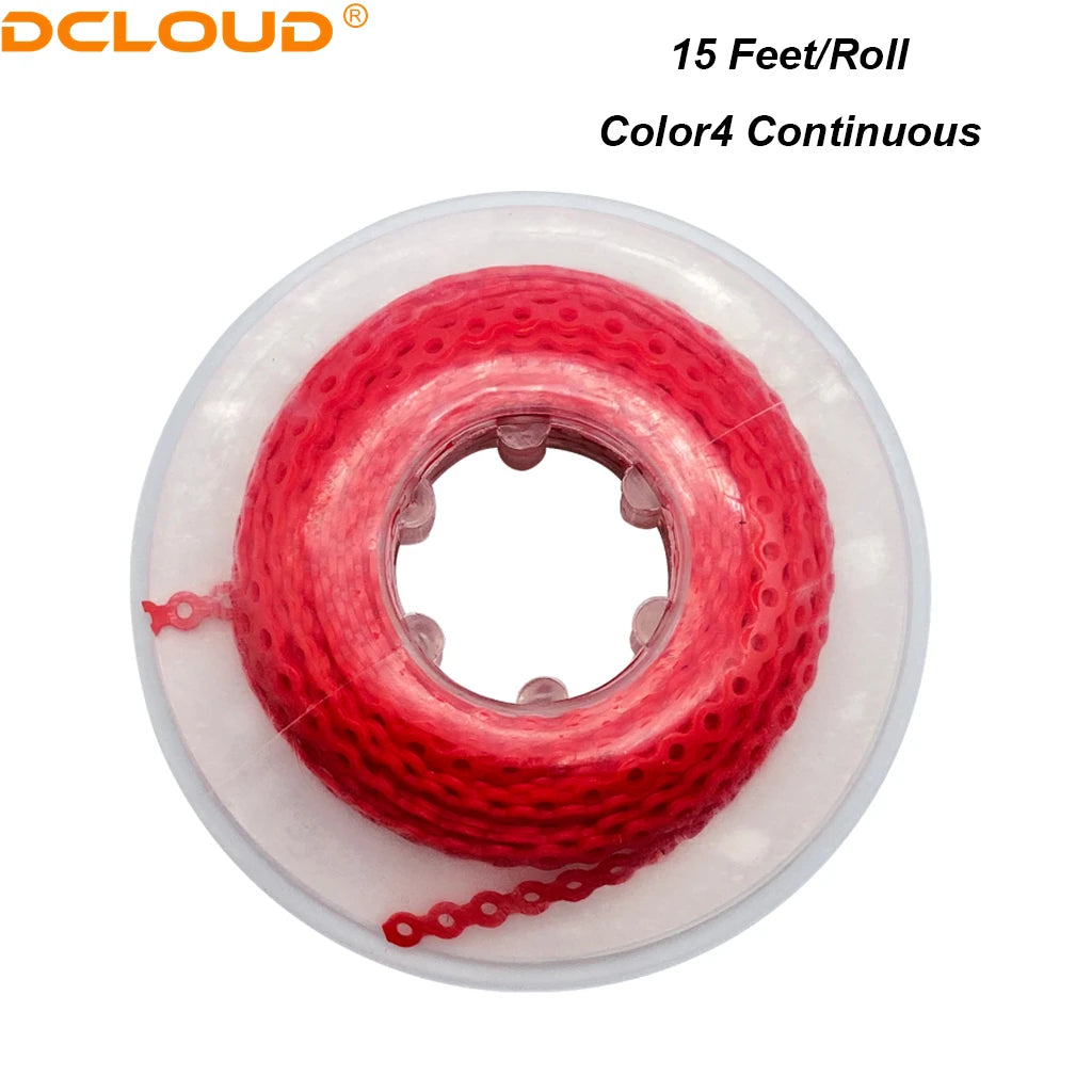 A roll of red Color4 continuous orthodontic elastic chains for dental use.
