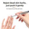 A hand gently pushes dead skin barbs from a finger using a professional stainless steel cuticle pusher.