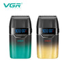 A pair of VGR electric beard trimmers, one in dark gray and the other in gold.