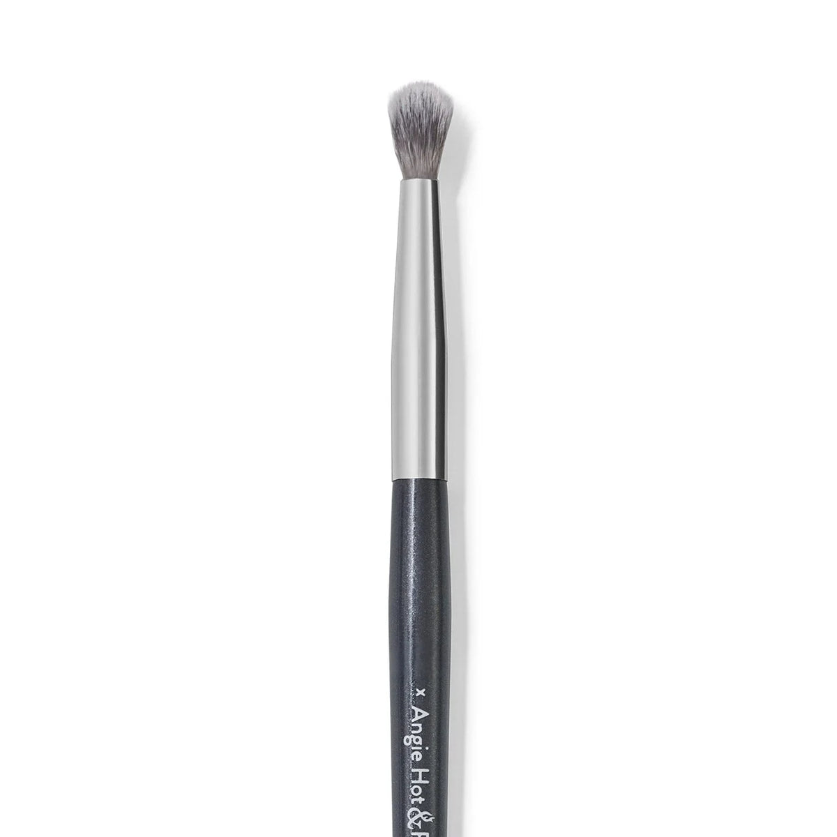 A slender, tapered concealer brush with a silver ferrule and black handle.