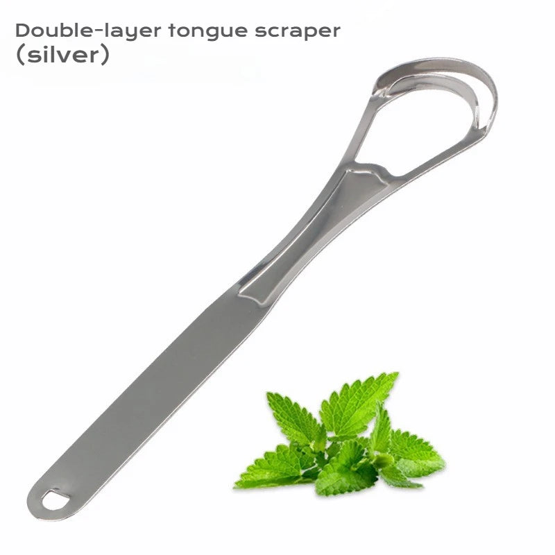 A silver double-layer tongue scraper is shown next to a sprig of mint leaves.