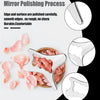 Stainless steel gua sha tool used to polish and smooth the surface of a pink stone.
