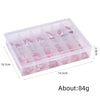 Clear plastic box containing a French style glossy press-on nail set for hands and toes
