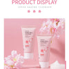 Display of Japan Sakura Cleanser products, including a tube and a jar, against a pink background with pink flowers.
