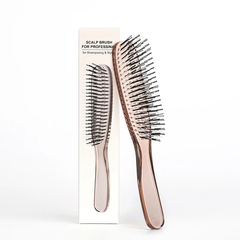 A wooden scalp brush for professional hair detangling shown next to its packaging.