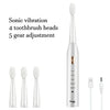A white ultrasonic electric toothbrush with a detachable head and a charging cable.