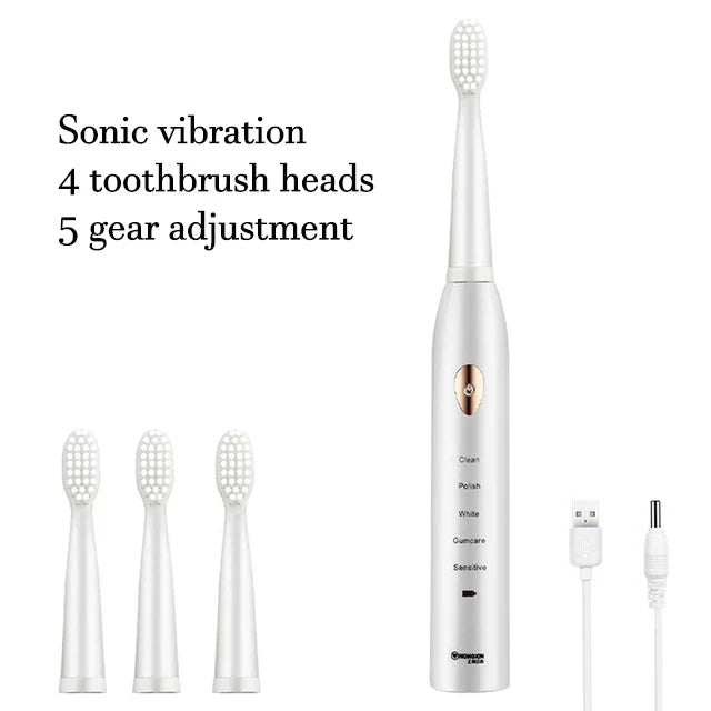 A white ultrasonic electric toothbrush with a detachable head and a charging cable.