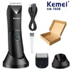 Black Kemei KM-1838 multi-function body hair trimmer with accessories and packaging