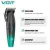 A black and green VGR professional cordless hair trimmer with a taper lever and LED display.