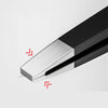 A close-up view of precision stainless steel eyebrow tweezers with a black handle and silver tip.