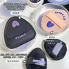 Poudres cosmétiques de différentes couleurs et textures, y compris du noir, rose et violet avec perlés