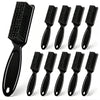 A set of black multifunctional plastic and nylon cleaning brushes shown from the side.