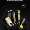A black grooming kit gift box containing various electric hair and shave tools like trimmers and clippers.