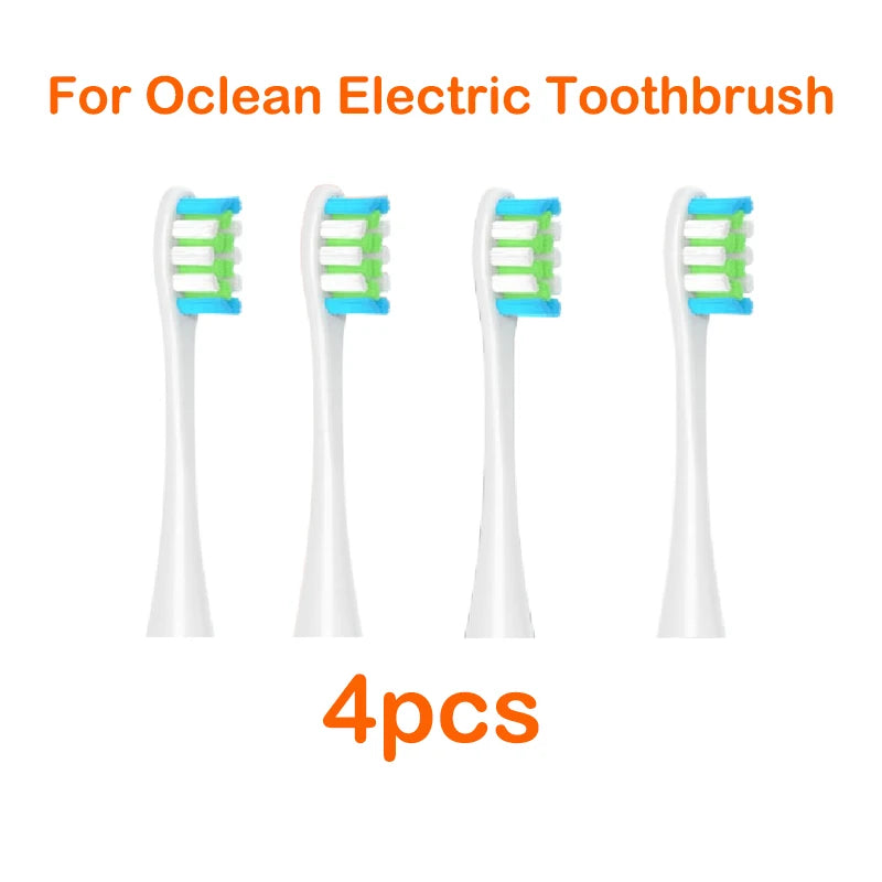Four replacement brush heads for an Ocean electric toothbrush are displayed.