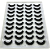 Plateau en plastique contenant un ensemble de faux cils de renard naturels pour usage cosmétique.