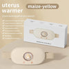 Beige beheiztes Massagegurt neben seiner Verpackungsbox