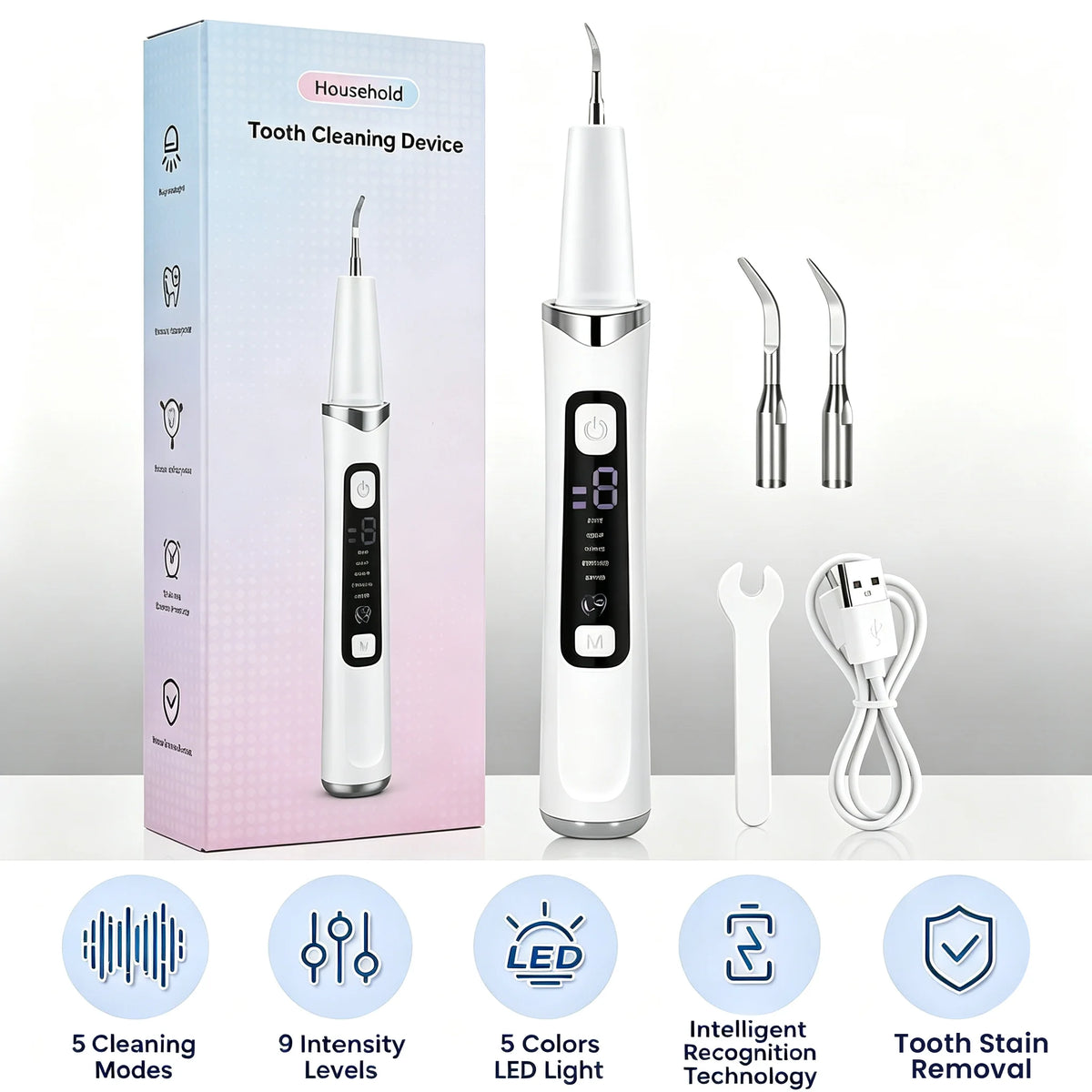 A white ultrasonic tooth cleaning device with accessories shown next to its packaging.