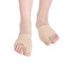 A pair of beige orthopedic toe separators and corrector pads placed on a white background.