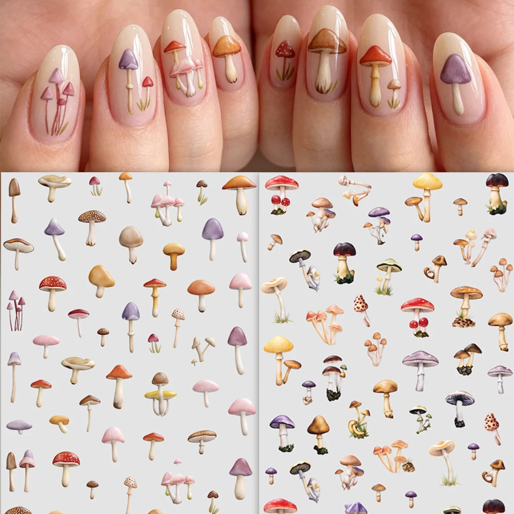 Close-up of fingers displaying various watercolor mushroom nail art designs on manicured nails.