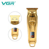 A gold-colored VGR cordless electric hair clipper with a protective guard and battery compartment.