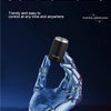 A close-up of a Konika Roman column gradient body electric shaver being held by a hand.