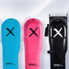 Three professional cordless hair clippers in blue, pink, and black shown against a white background.