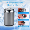 A silver waterproof mini electric shaver is shown against a snowy mountain background with close-ups of its components.