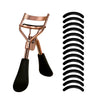 A professional stainless steel eyelash curler set showing the curler tool and a coil of black curler pads.