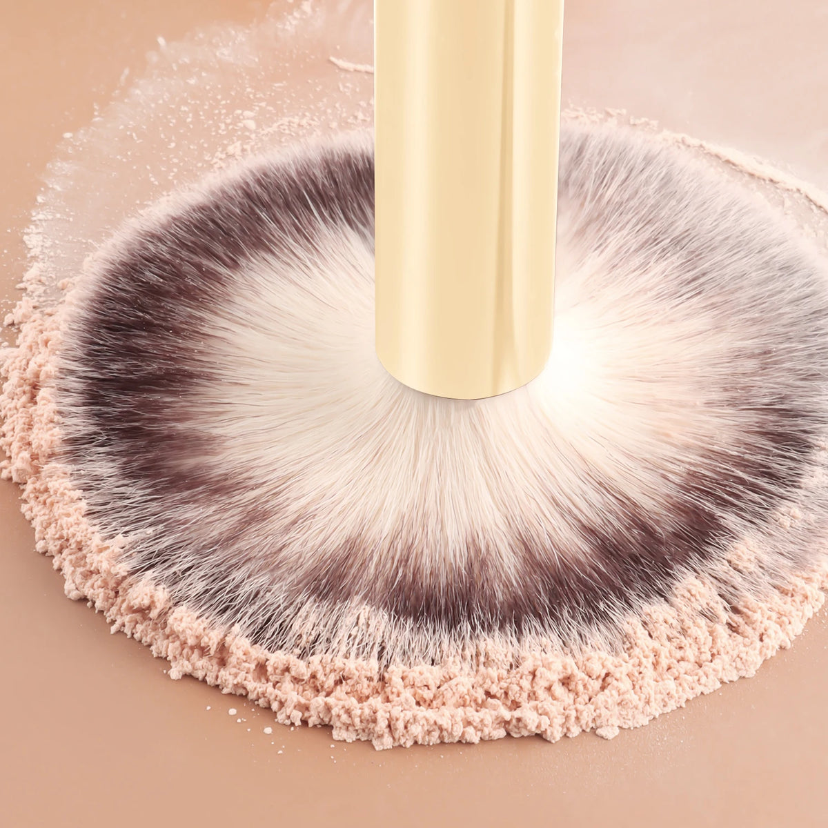 A professional makeup brush set with a light yellow handle and soft, fluffy bristles is shown on a neutral background.