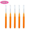 A set of five mini brow and eyelash combs in orange color.