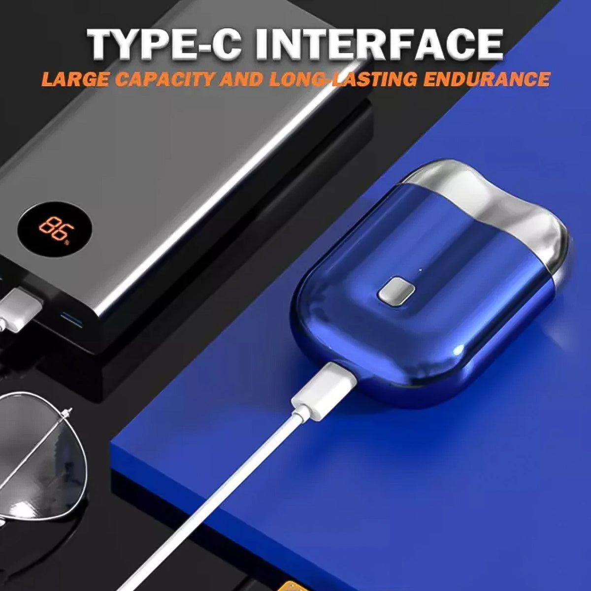 A close-up of a blue cordless electric razor shaver with a white cord, displayed on a dark surface.