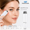 A white facial massager device is shown next to various interchangeable silicone tips for facial and eye care.