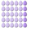 Une grille de vingt petits éponges de fondation violettes pour un application précise.