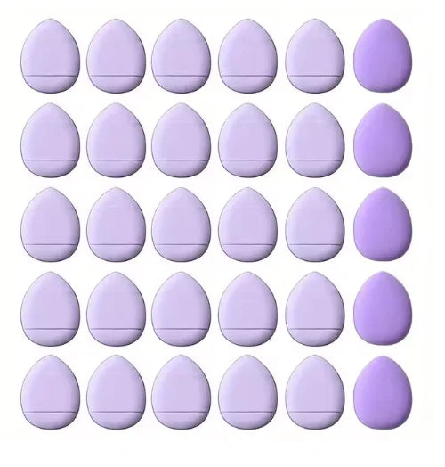 Une grille de vingt petits éponges de fondation violettes pour un application précise.