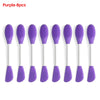 A set of eight purple silicone facial mask applicators displayed in a row.