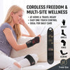 A woman is using a cordless multi-site wellness device for daily care, showing the hand and wrist support.