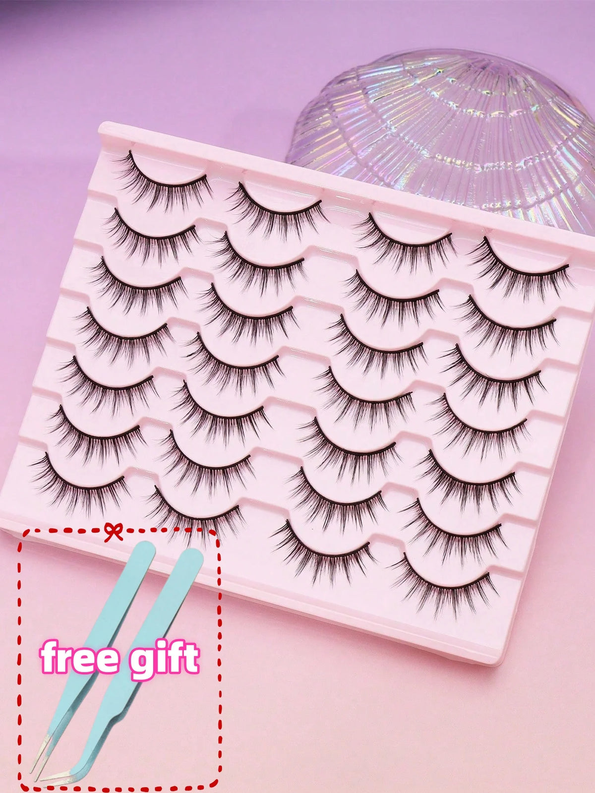 Rosa Plastik-Lash-Tray mit schwarzen Wimpern und klarem Kuppel-Accessoire, inklusive kostenlosen Pinzettenpaar.