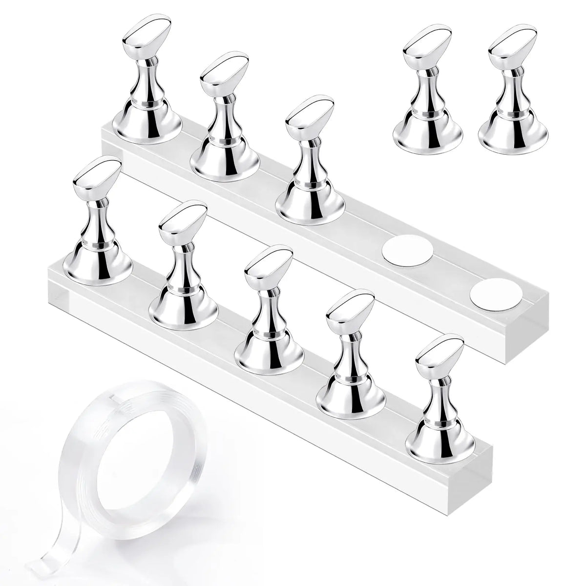 A set of silver magnetic nail art display stands and a clear ring displayed on a white plastic stand.
