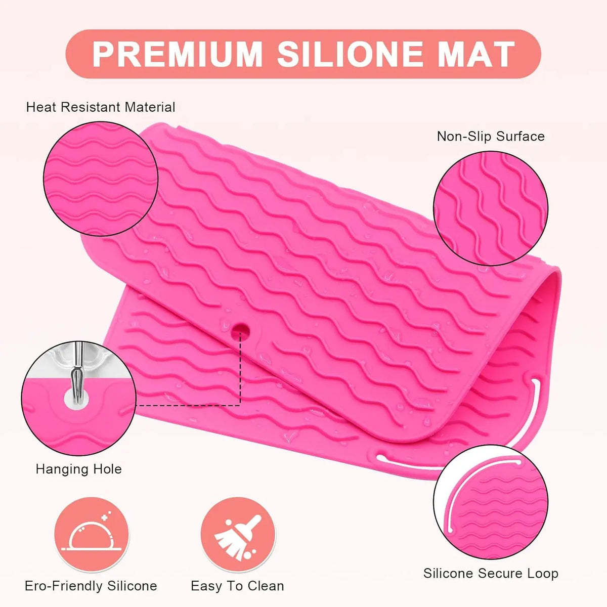 Pink silicone mat with ridges and a hanging hole designed for non-slip surface and easy cleaning