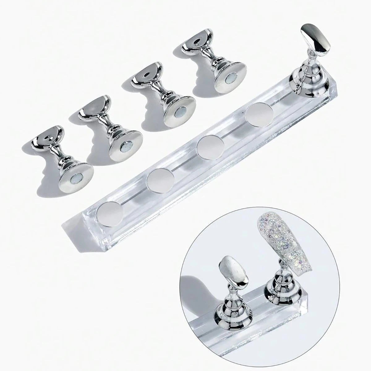 A silver magnetic nail art display stand set featuring several nail tools and a long display bar.