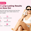 A woman is using an IPL hair removal device on her upper body while relaxing in a chair.