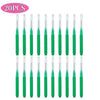 A set of 20 mini brow and eyelash combs in green.